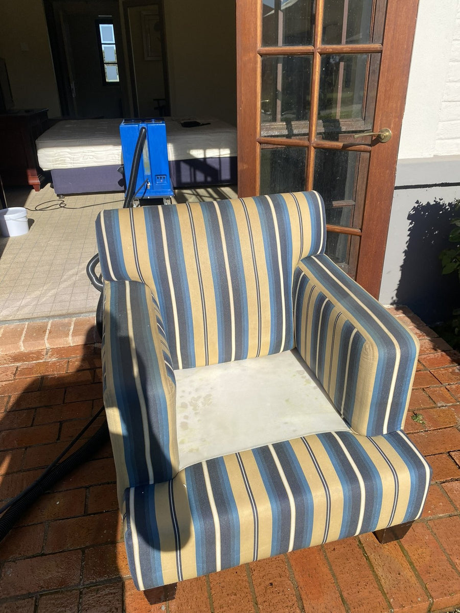 A-Z Chem upholstery cleaning work on a striped fabric chair